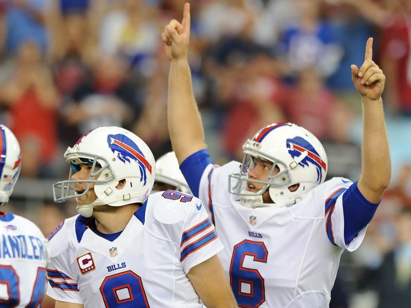 Rian Lindell also kicks the winning field goal as the Bills upset Arizona in overtime.