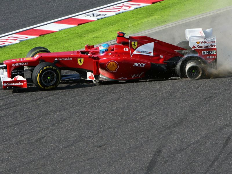 Alonso's race comes to a very premature - and costly - end