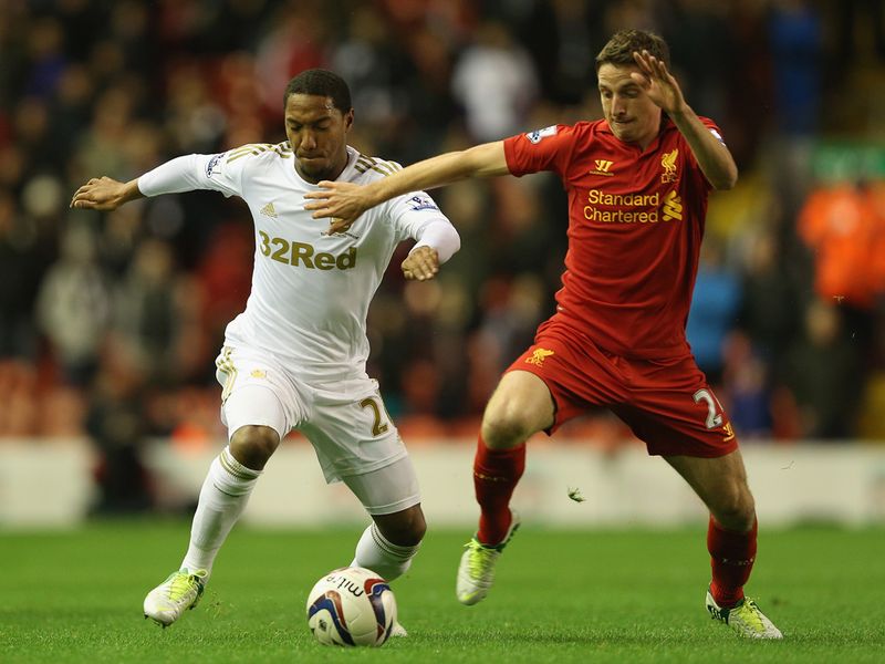Liverpool midfielder Joe Allen was in action against his former club Swansea.