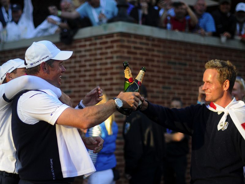 Lee Westwood and Luke Donald pop the champagne corks.