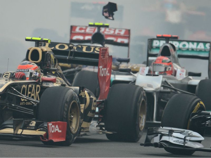 Michael Schumacher picked up a puncture after contact with Jean-Eric Vergne