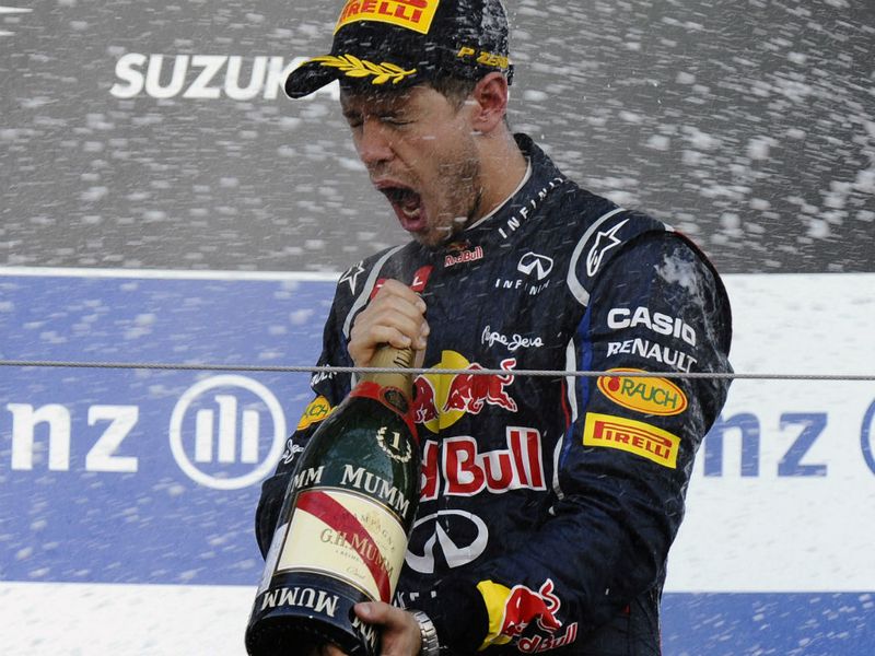Vettel celebrates on the podium