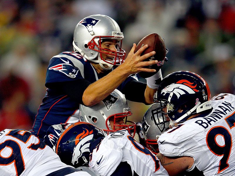 Tom Brady led the New England Patriots to victory over arch rival Peyton Manning and his Denver Broncos.