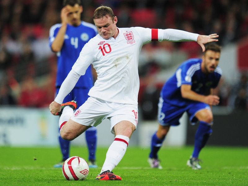 Rooney fires home the first from penalty spot