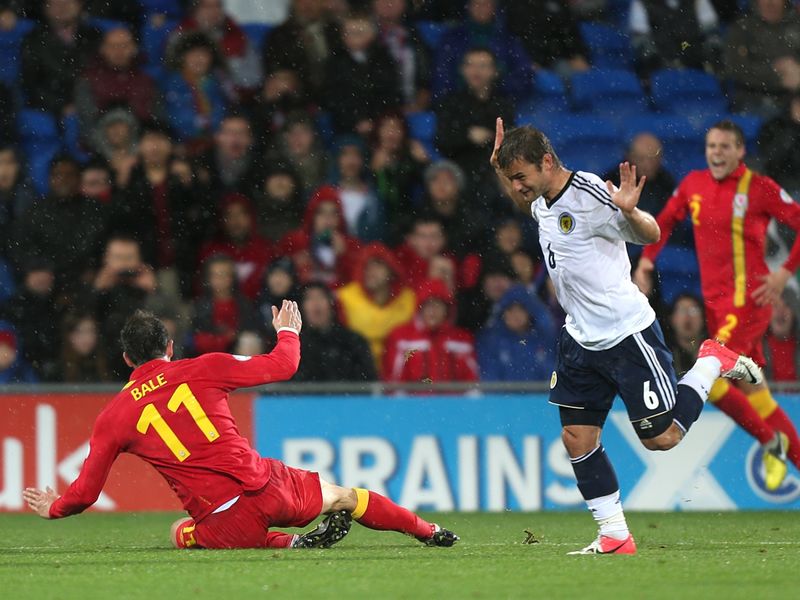 Gareth Bale goes down to win penalty for Wales