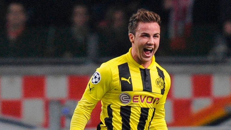 Mario Gotze celebrates after finding the net against Ajax