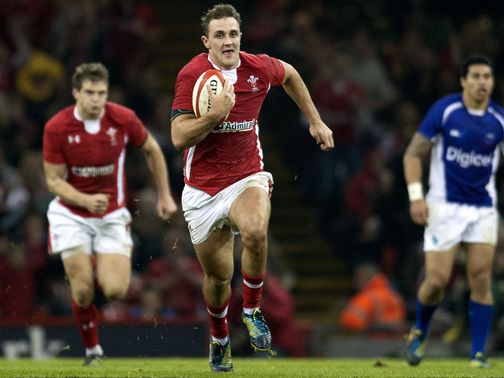 Debutant Ashley Beck claims a Wales try