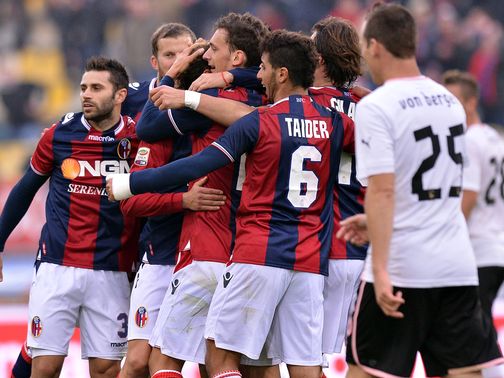 Manolo Gabbiadini is mobbed after his goal