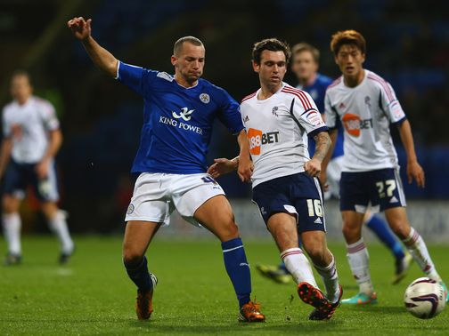 Drinkwater and Davies battle for the ball