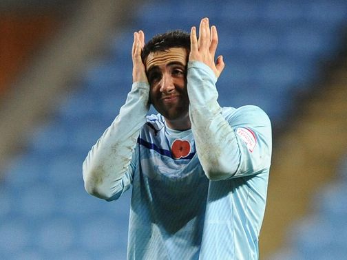 Callum Ball shows his dejection after Coventry's defeat