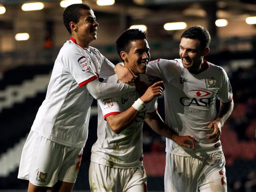 Chicksen: Celebrates goal for Dons