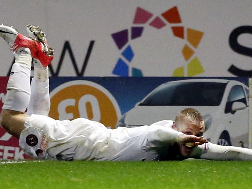 Johnny Russell celebrates his goal for Dundee United