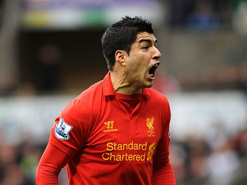 Luis Suarez: Claims he is happy at Anfield