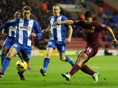 Sergio Aguero has a shot on goal for Man City