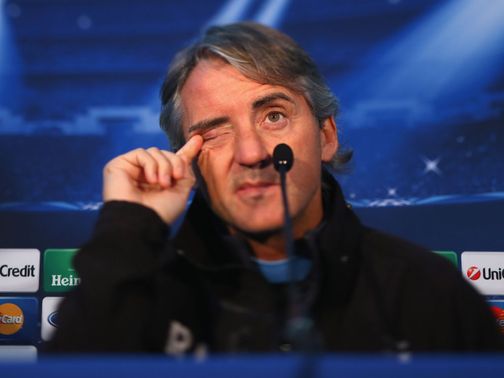 Roberto Mancini faces the press on Tuesday.