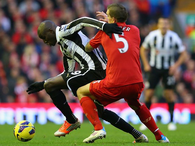 Demba Ba takes on Daniel Agger