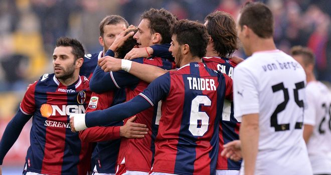 Manolo Gabbiadini is mobbed after his goal