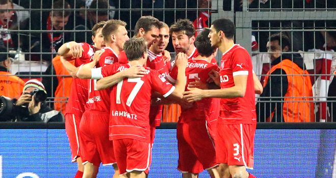 Dusseldorf celebrate their equalising goal