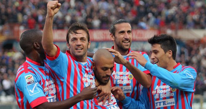 Sergio Almiron and Catania celebrate