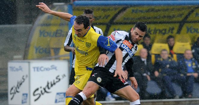Dario Dainelli gets away from Antonio Di Natale