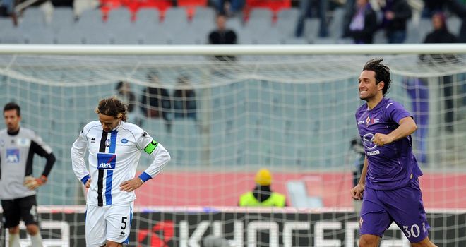 Luca Toni celebrates after scoring his side's fourth goal