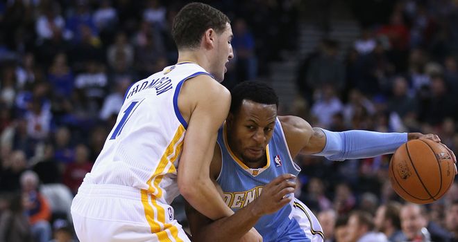 Andre Iguodala takes on Klay Thompson