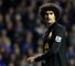 Marouane Fellaini: Everton midfielder has been told he must learn to cope with unsettling opponents by team-mate Sylvain Distin
