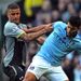 Kyle Walker battles for possession with Sergio Aguero.