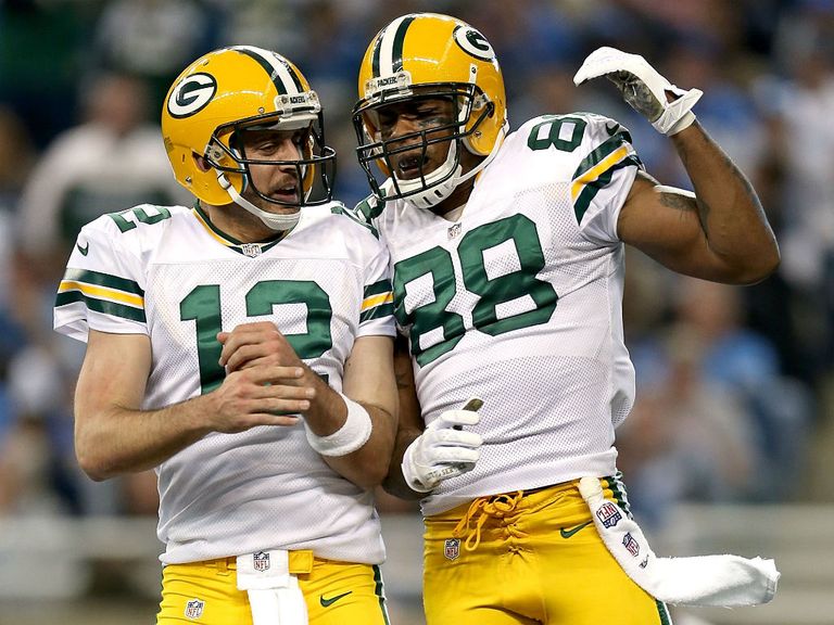 Aaron Rodgers and Jermicheal Finley celebrate a Green Bay TD
