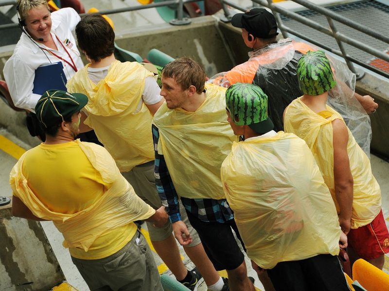 Fans arrived at the ground, prepared for some rain...