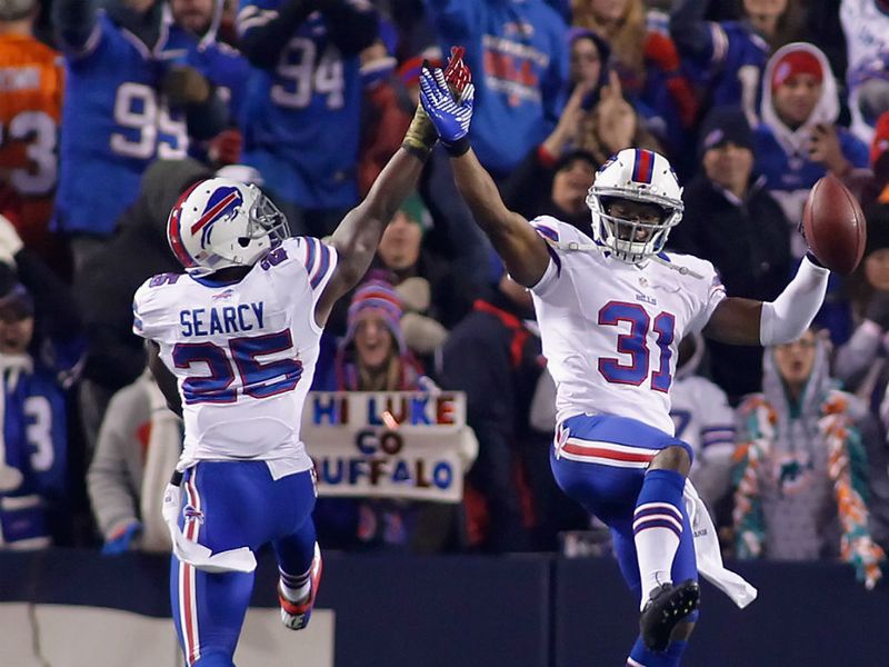 Jairus Byrd and Da'Norris Searcy celebrate a Buffalo interception against Miami