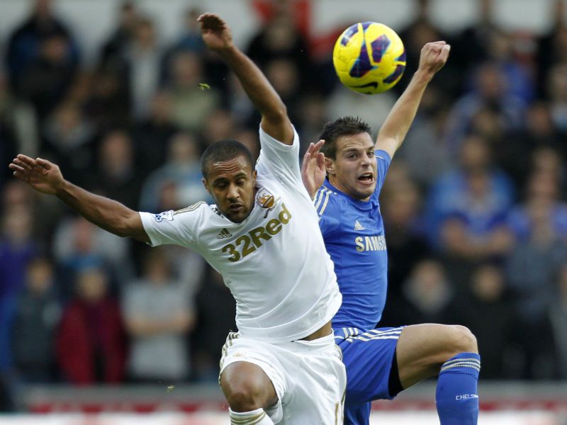 Good battle: Chelsea's Cesar Azpilicueta vies with Swansea City's Wayne Routledge