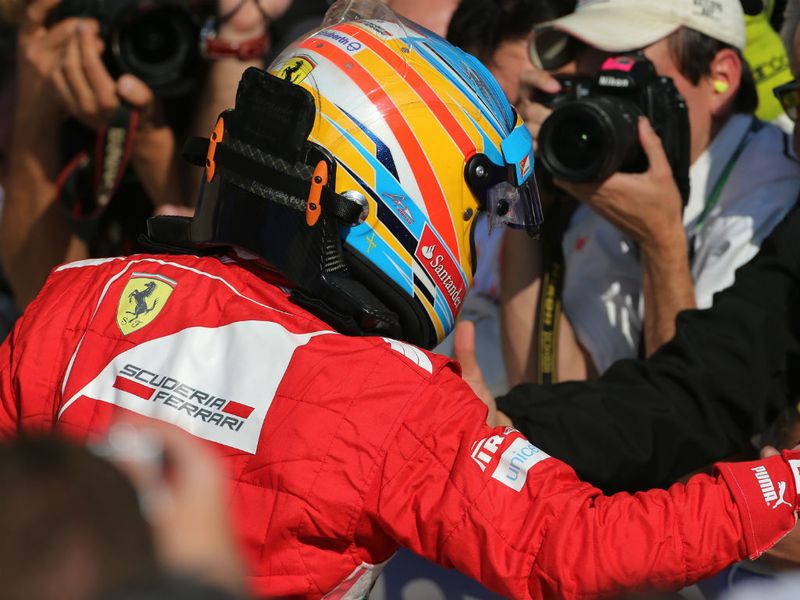 Alonso is congratulated in parc ferme