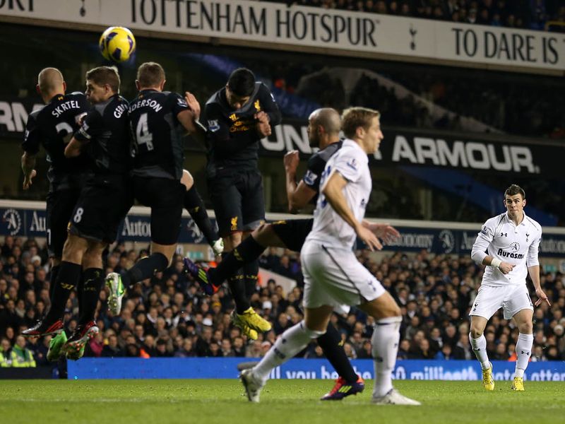 Ten minutes later it's 2-0 to Tottenham, Bale's free-kick deflects off the head of Henderson to wrong-foot Pepe Reina.