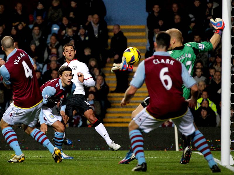 Five minutes later the visitors are level, Rafael lobs a cross to the far post and Chicharito's cross-cum-shot hits Ron Vlaar before nestling in the net.
