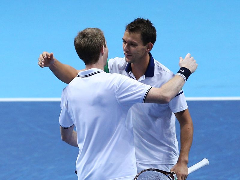 Nielsen and Marray celebrate after winning a dramatic deciding set 12-10 to delight the London crowd