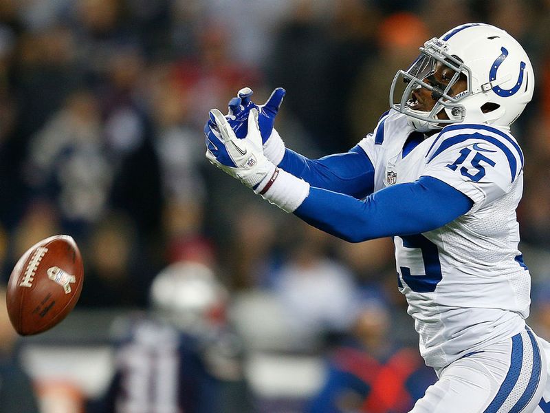 LaVon Brazill fails to catch the ball during their game against the New England Patriots