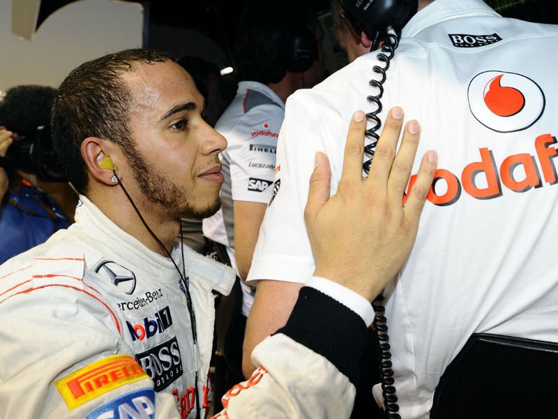 Commiserations on the McLaren pit wall