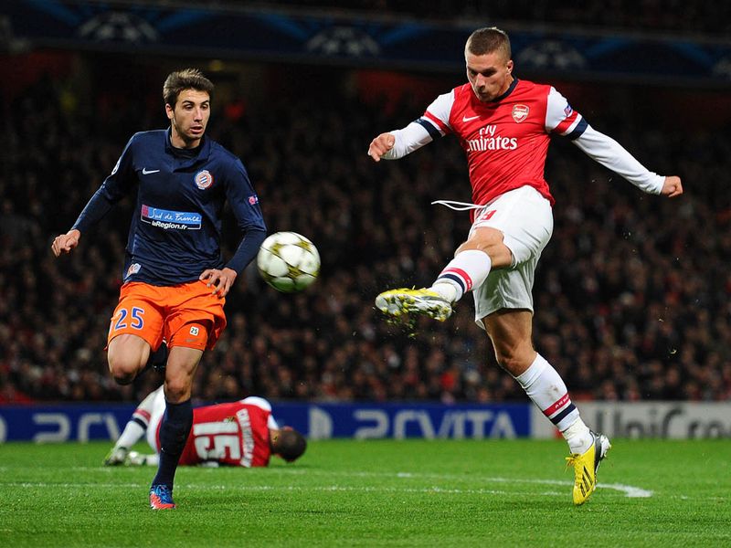 Olivier Giroud lofts a pass over the French defence and Lukas Podolski crashes home a left-foot volley to send the Emirates crowd wild.