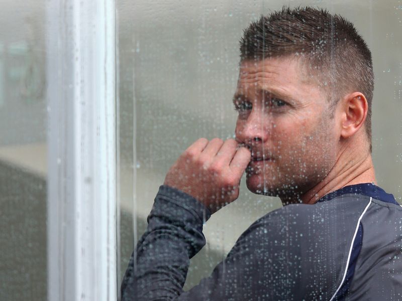 ...but Michael Clarke had to watch as the day drained away without a ball bowled.