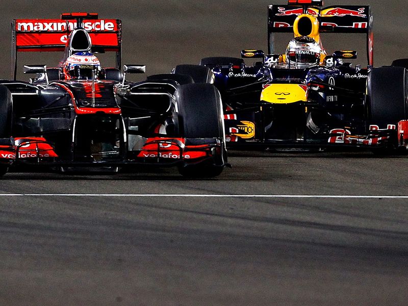 Sebastain Vettel overtakes Jenson Button for third