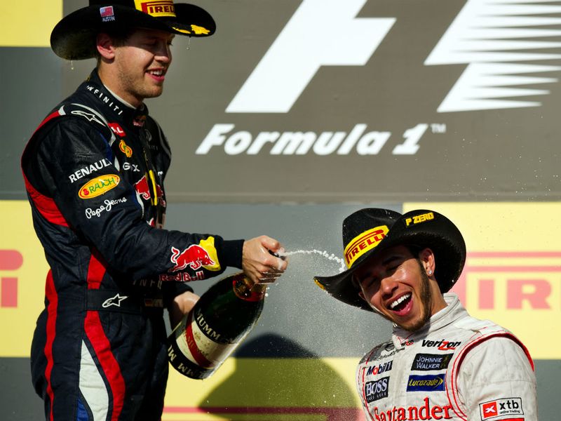 Vettel soaks Hamilton