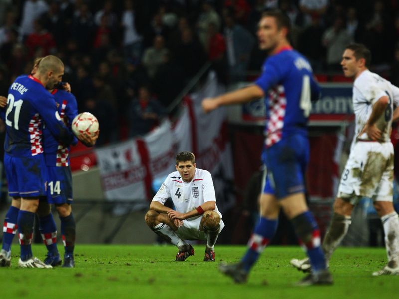 A dejected Gerrard looks on as England suffer defeat at Wembley to Croatia, ending their chances of qualifying for Euro 2008.