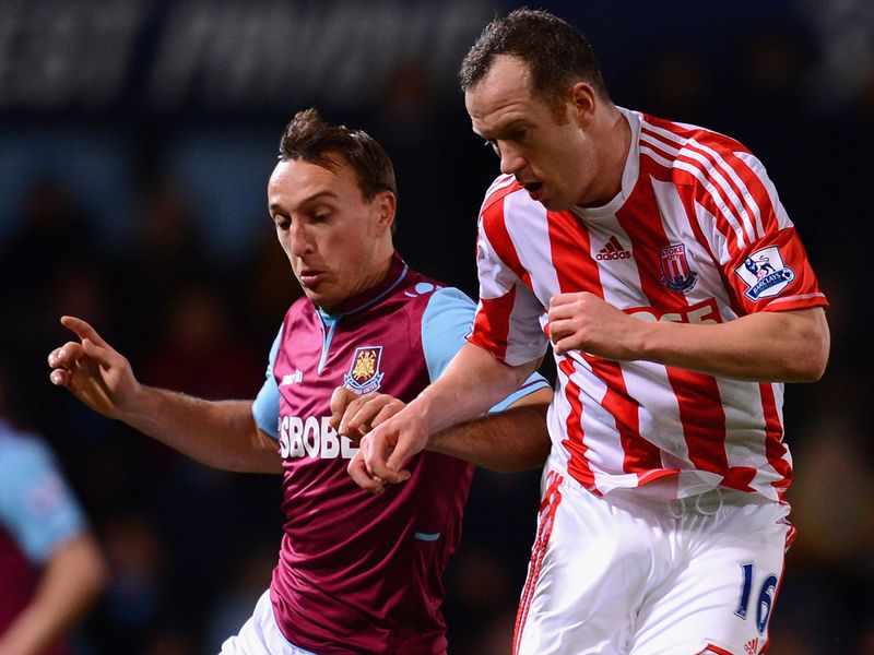 Charlie Adam is well marshalled by Mark Noble.