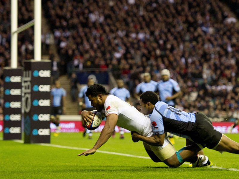 Manu Tuilagi grabbed two tries as England comfortably pulled away