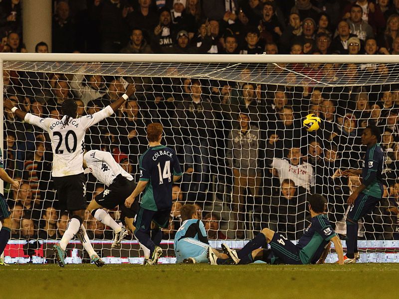 Mladen Petric draws ten-man Fulham level with a close-range finish from Damien Duff's cross.