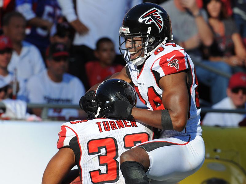 Atlanta running back Michael Turner celebrates a touchdown which aided a 24-23 victory against Tampa Bay