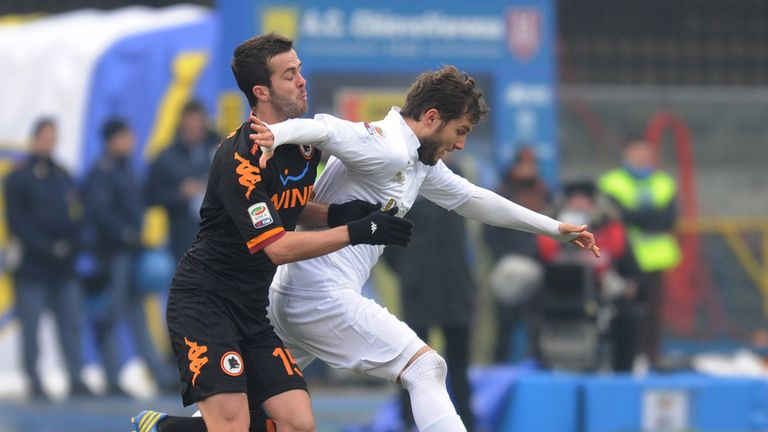 Miralem Pjanic battles with Perparim Hetemai