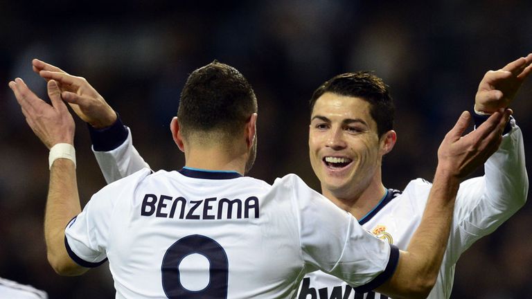 Cristiano Ronaldo celebrates with Karim Benzema following his goal