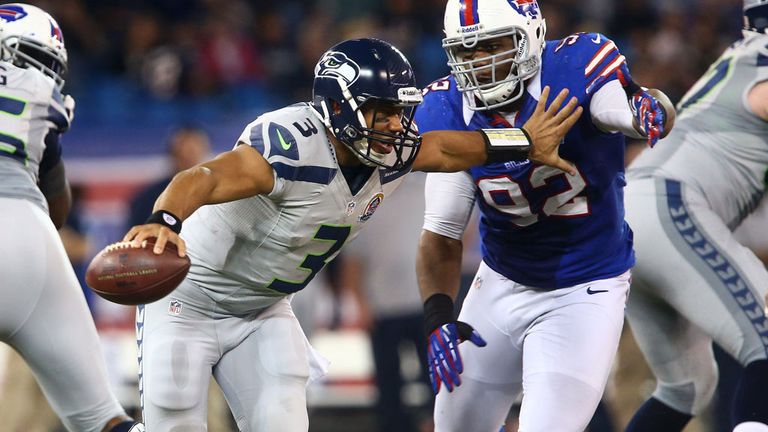 Russell Wilson: Ran for three touchdowns and threw for another in Seattle's comfortable win